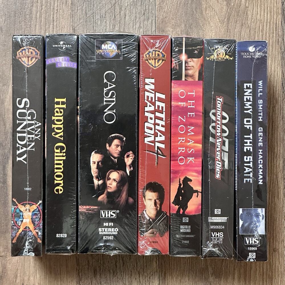 Sealed VHS Movie Lot 7 Action Comedy Drama Casino Happy Gilmore James Bond